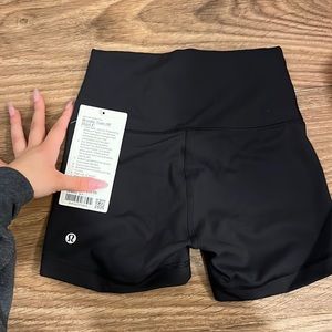 Wunder train high rise shorts short 4”